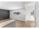 Bright entryway with modern wall accents and hardwood floors at 454 Tulip Dr, Mooresville, IN 46158