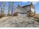 House exterior with attached garage and driveway at 454 Tulip Dr, Mooresville, IN 46158