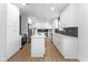 Modern kitchen with white cabinets and quartz countertops at 454 Tulip Dr, Mooresville, IN 46158