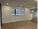 Spacious living room with hardwood floors and large window at 454 Tulip Dr, Mooresville, IN 46158