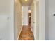 Bright hallway with tile flooring leading to other rooms at 5701 Brookstone Dr, Indianapolis, IN 46234