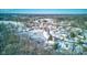 Wide aerial view of a residential area in a snowy landscape at 6361 Crystal Springs Dr, Avon, IN 46123
