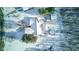 Overhead view of a house and snowy backyard with a pool at 6361 Crystal Springs Dr, Avon, IN 46123
