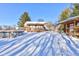 Winter view of a backyard with a pool, cabin, and pergola at 6361 Crystal Springs Dr, Avon, IN 46123