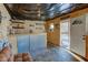 Recreation room featuring a bar, seating, and access to a deck at 6361 Crystal Springs Dr, Avon, IN 46123