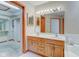 Bathroom with double vanity, walk-in closet, and bathtub at 6361 Crystal Springs Dr, Avon, IN 46123