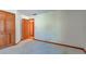 Simple bedroom with carpeted floors and double doors at 6361 Crystal Springs Dr, Avon, IN 46123