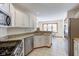 White kitchen with stainless steel appliances at 6361 Crystal Springs Dr, Avon, IN 46123