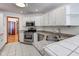 Kitchen boasts stainless steel appliances and white cabinets at 6361 Crystal Springs Dr, Avon, IN 46123