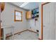 Laundry room with utility sink and overhead shelving at 6361 Crystal Springs Dr, Avon, IN 46123