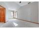 Bright main bedroom with carpeted floor, sliding glass doors to patio, and vaulted ceiling at 6361 Crystal Springs Dr, Avon, IN 46123
