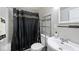 Bathroom with a tub/shower, single sink vanity, and a neutral color scheme at 715 N Warman Ave, Indianapolis, IN 46222
