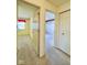 Hallway connecting bedrooms with carpet flooring at 7704 Winding Creek Dr, Indianapolis, IN 46236