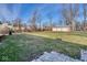 Large backyard with detached garage and spacious grassy area at 8390 E Us 36 Hwy, Avon, IN 46123