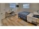Bedroom with double bed, light wood floors, and workspace at 8390 E Us 36 Hwy, Avon, IN 46123
