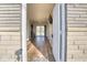 Bright and airy entryway with light wood floors and view into the living room at 8390 E Us 36 Hwy, Avon, IN 46123