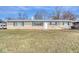 Ranch style home with brick exterior, landscaped lawn, and a spacious front yard at 8390 E Us 36 Hwy, Avon, IN 46123