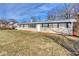 Ranch style home with brick exterior, landscaped lawn, and a spacious front yard at 8390 E Us 36 Hwy, Avon, IN 46123