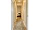 Bright hallway with wood floors and access to bedrooms at 8390 E Us 36 Hwy, Avon, IN 46123