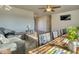 Spacious living room with hardwood floors, sectional sofa, and dining table at 8390 E Us 36 Hwy, Avon, IN 46123