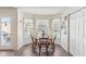 Cozy breakfast nook with round table and chairs, bay window at 870 Harvest Lake Dr, Brownsburg, IN 46112