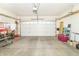 Attached garage with overhead door and ample storage at 958 Kirkpatrick Pl # F, Greenfield, IN 46140