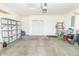 Spacious garage with storage shelving and extra door at 958 Kirkpatrick Pl # F, Greenfield, IN 46140