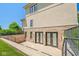 Basement with stone wall finish and walkout French doors at 1023 Westview Point Dr, Columbus, IN 47201