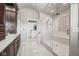Bathroom with walk-in shower, vanity, and access to closet at 1023 Westview Point Dr, Columbus, IN 47201
