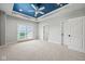 Bedroom with french doors and a blue ceiling at 1023 Westview Point Dr, Columbus, IN 47201