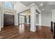 Spacious entryway with hardwood floors and a grand staircase at 1023 Westview Point Dr, Columbus, IN 47201