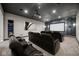 Basement home theater with seating and large projection screen at 1023 Westview Point Dr, Columbus, IN 47201