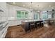 Spacious kitchen features a large island, hardwood floors, and ample natural light at 1023 Westview Point Dr, Columbus, IN 47201