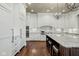 Gourmet kitchen boasts granite counters, stainless steel appliances, and custom cabinetry at 1023 Westview Point Dr, Columbus, IN 47201