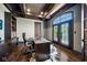 Home office with built-in shelves, hardwood floors and French doors at 1023 Westview Point Dr, Columbus, IN 47201