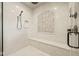 Large walk-in shower with mosaic tile and built-in seat at 1023 Westview Point Dr, Columbus, IN 47201