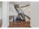 Elegant curved staircase with wrought iron railing at 1023 Westview Point Dr, Columbus, IN 47201