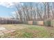 Spacious backyard with a patio and wooden fence at 1127 Maple Stream Dr, Indianapolis, IN 46217