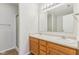 Bathroom with double vanity and shower at 1127 Maple Stream Dr, Indianapolis, IN 46217
