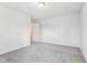 Spacious bedroom featuring grey carpet and neutral wall paint at 1127 Maple Stream Dr, Indianapolis, IN 46217