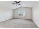 Spacious bedroom with ceiling fan and large window at 1127 Maple Stream Dr, Indianapolis, IN 46217