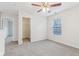 Spacious bedroom with walk-in closet and carpet at 1127 Maple Stream Dr, Indianapolis, IN 46217