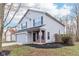 Two-story house with gray siding, brick accents, and a fenced backyard at 1127 Maple Stream Dr, Indianapolis, IN 46217