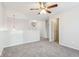 Bright hallway with gray carpet and pendant light at 1127 Maple Stream Dr, Indianapolis, IN 46217