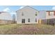 Two-story house back with patio and fenced yard at 1127 Maple Stream Dr, Indianapolis, IN 46217