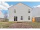 Two story house back, with a patio and yard at 1127 Maple Stream Dr, Indianapolis, IN 46217