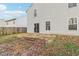 Two-story house back with patio and fenced yard at 1127 Maple Stream Dr, Indianapolis, IN 46217