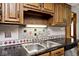 Kitchen sink with granite countertop and double basin at 1507 N County Road 600 E, Avon, IN 46123