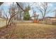 Large backyard with grassy area and wooden fence at 2314 E 58Th St, Indianapolis, IN 46220