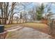 Large backyard with grassy area and concrete patio at 2314 E 58Th St, Indianapolis, IN 46220